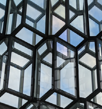 Closeup of a building with geometric construction.