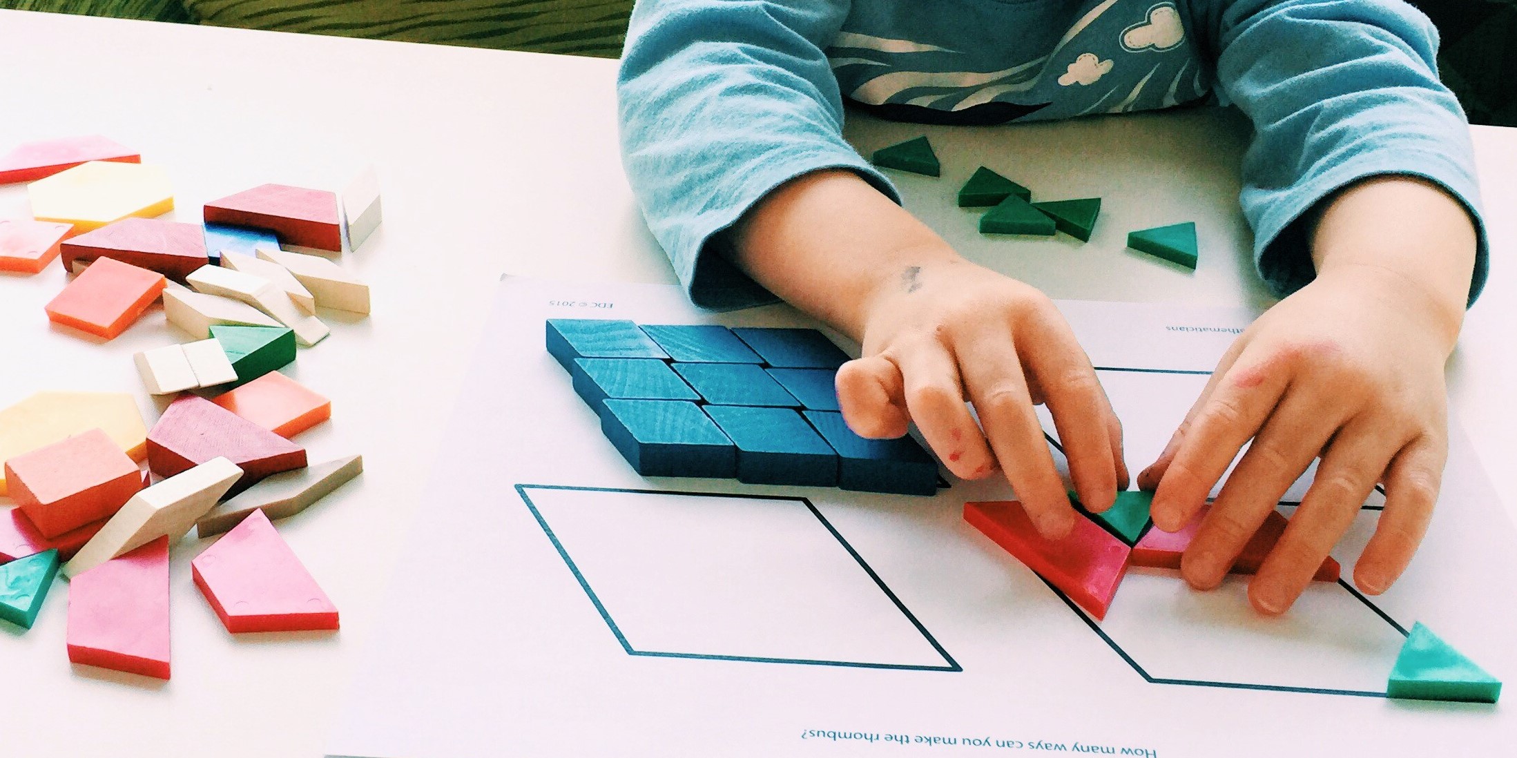 Student using math manipulatives
